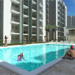 Adult and children's pool surrounded by the towers – Venecia de la Sierra, Nueva Andrea Carolina area, Santa Marta